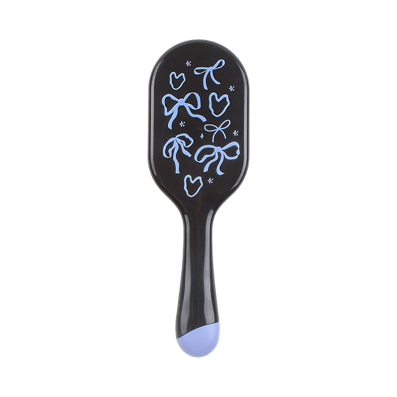 黑底蓝蝴蝶结印花气垫梳